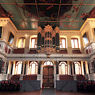 Sheldonian Theatre Oxford, Reinstated Sir Christopher Wren Scheme of 1669, Paint Analysis and Historic Interior Investigations. Winner of the Oxford Preservation Trust Award for Building Conservation 2011. Interior Paint Research and Paint Analysis. Employer: University of Lincoln. Client: the University of Oxford Estate Services. Image Courtesy of the UoO Estate Services